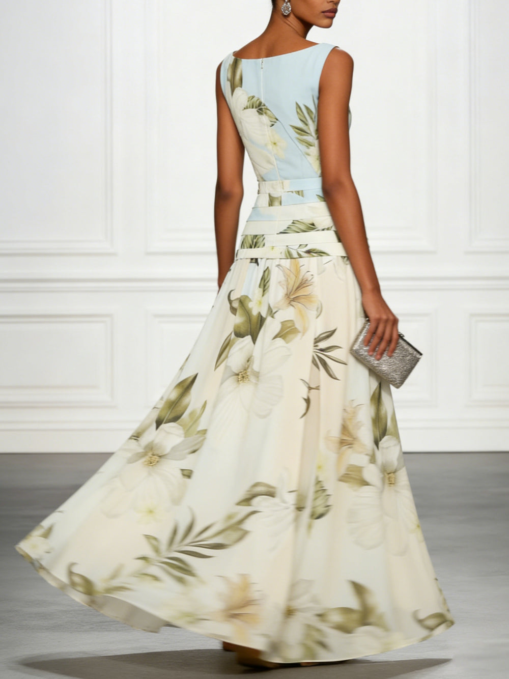Floral maxi dress showing full-length botanical print and boat neckline