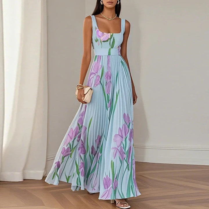 Floral square neck sleeveless pleated maxi dress showing flowing A-line silhouette, back view