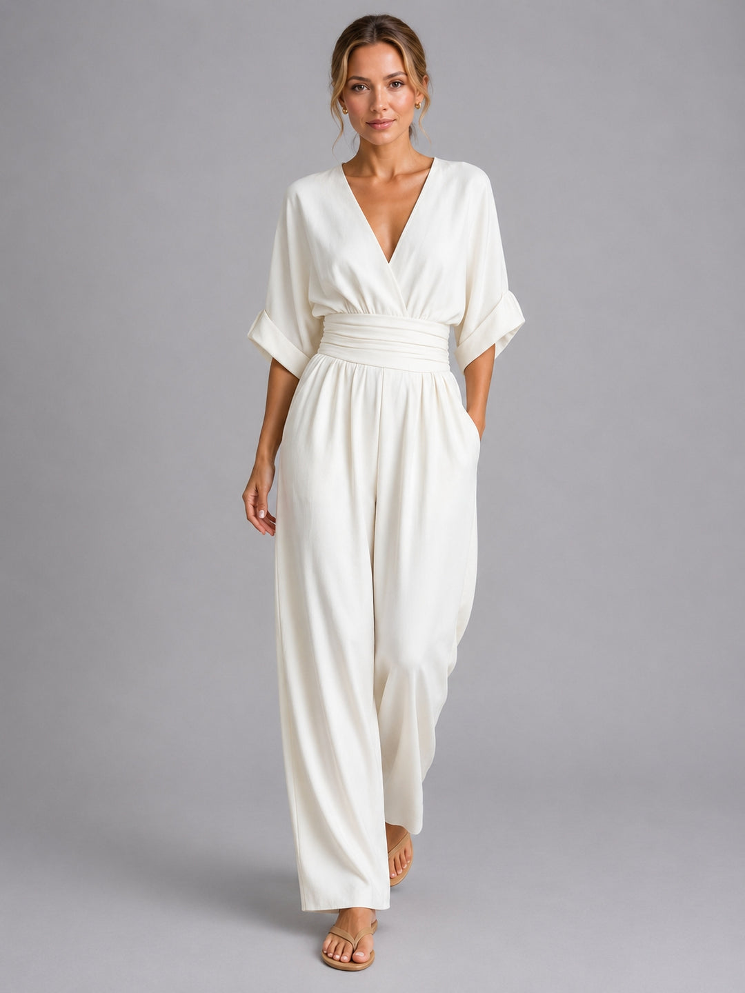 Cinched waist wide-leg jumpsuit in white, front view