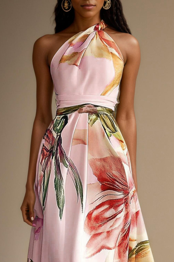 Close-up of floral print on satin one-shoulder wedding guest dress
