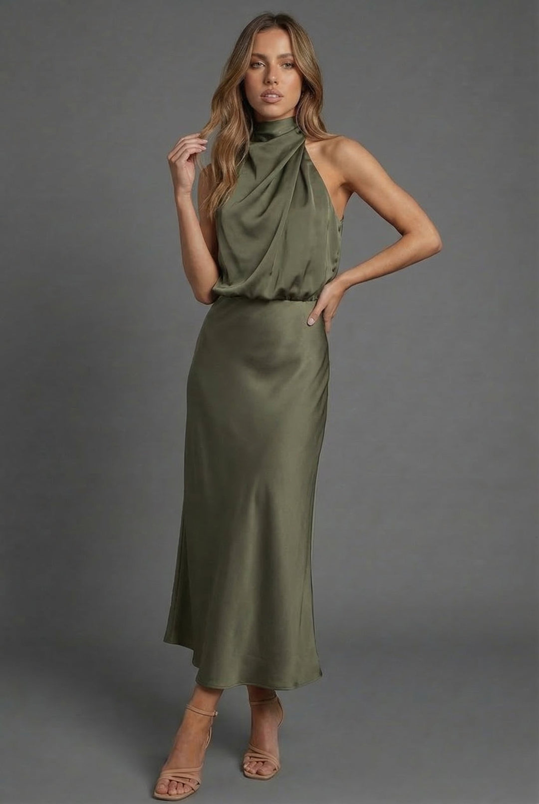 Halterneck satin style wedding guest midi dress, full length side view